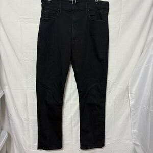 Black "Mother" brand jeans.